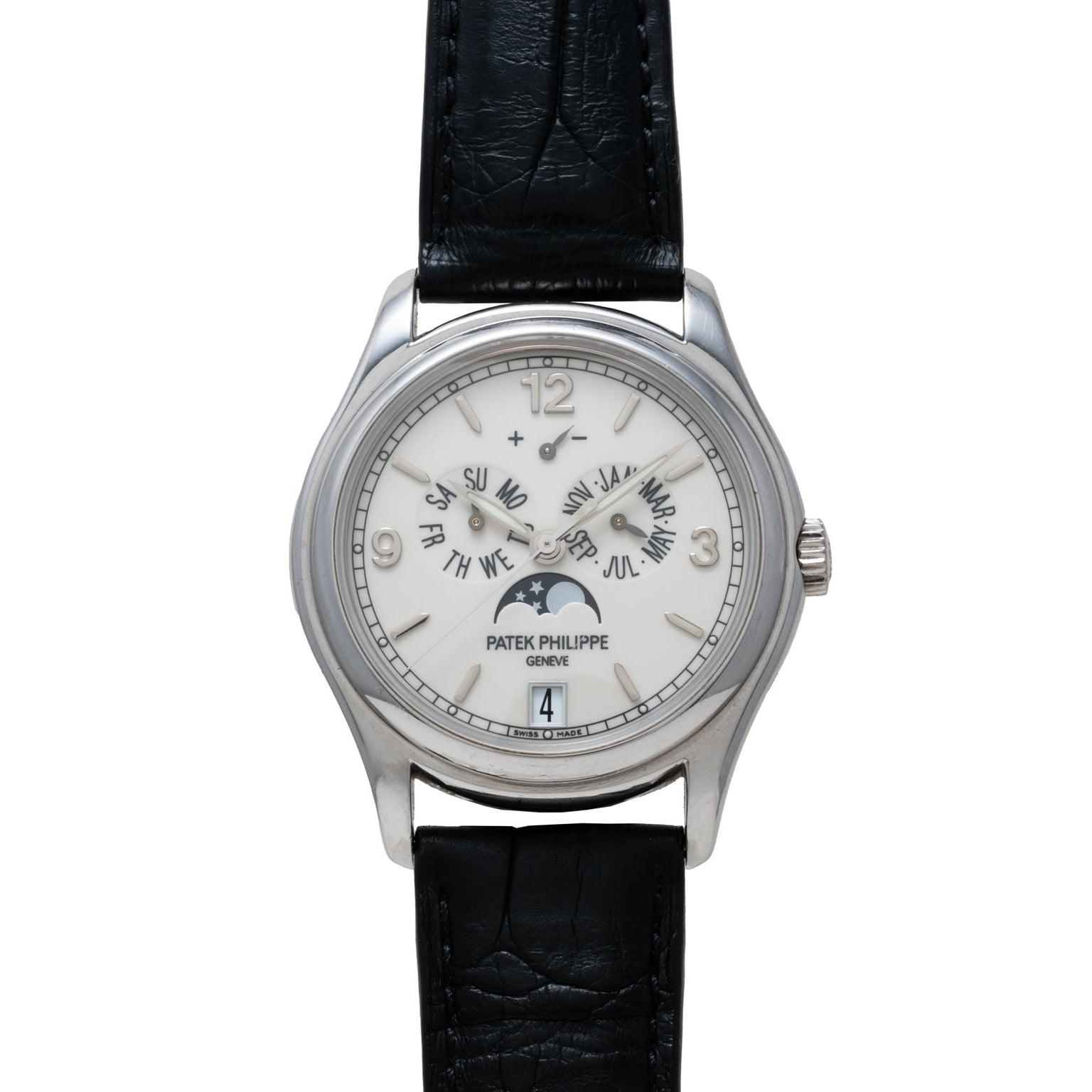 The Patek Philippe Annual Calendar Moonphase features a silver case, white dial, black leather strap, and multiple subdials.