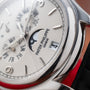 Close-up of the Patek Philippe Annual Calendar Moonphase watch displaying the date, moon phase, and day/month indicators.