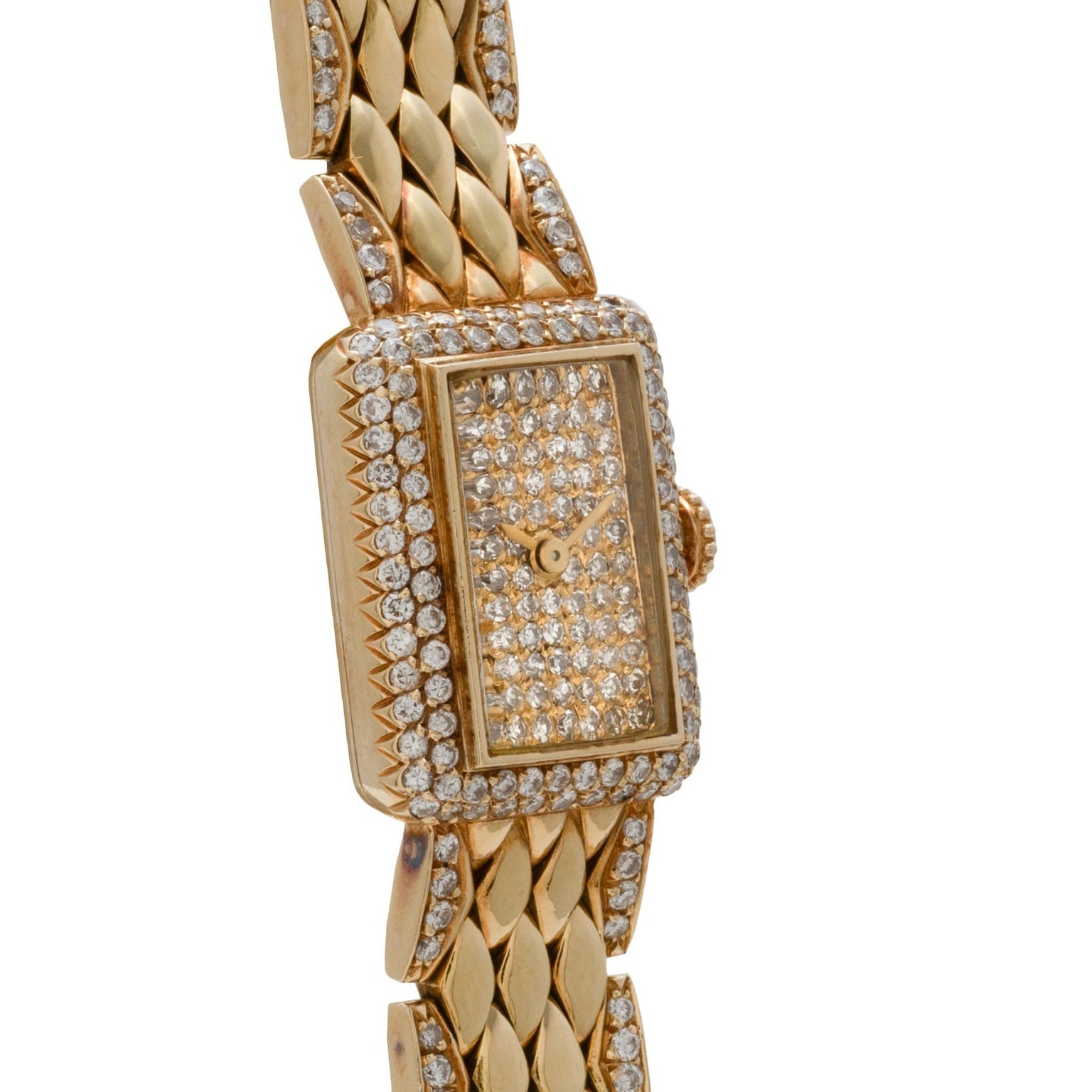The Cartier Tank Mini Diamond features a rectangular gold case with a diamond-encrusted face, bezel, and band links.