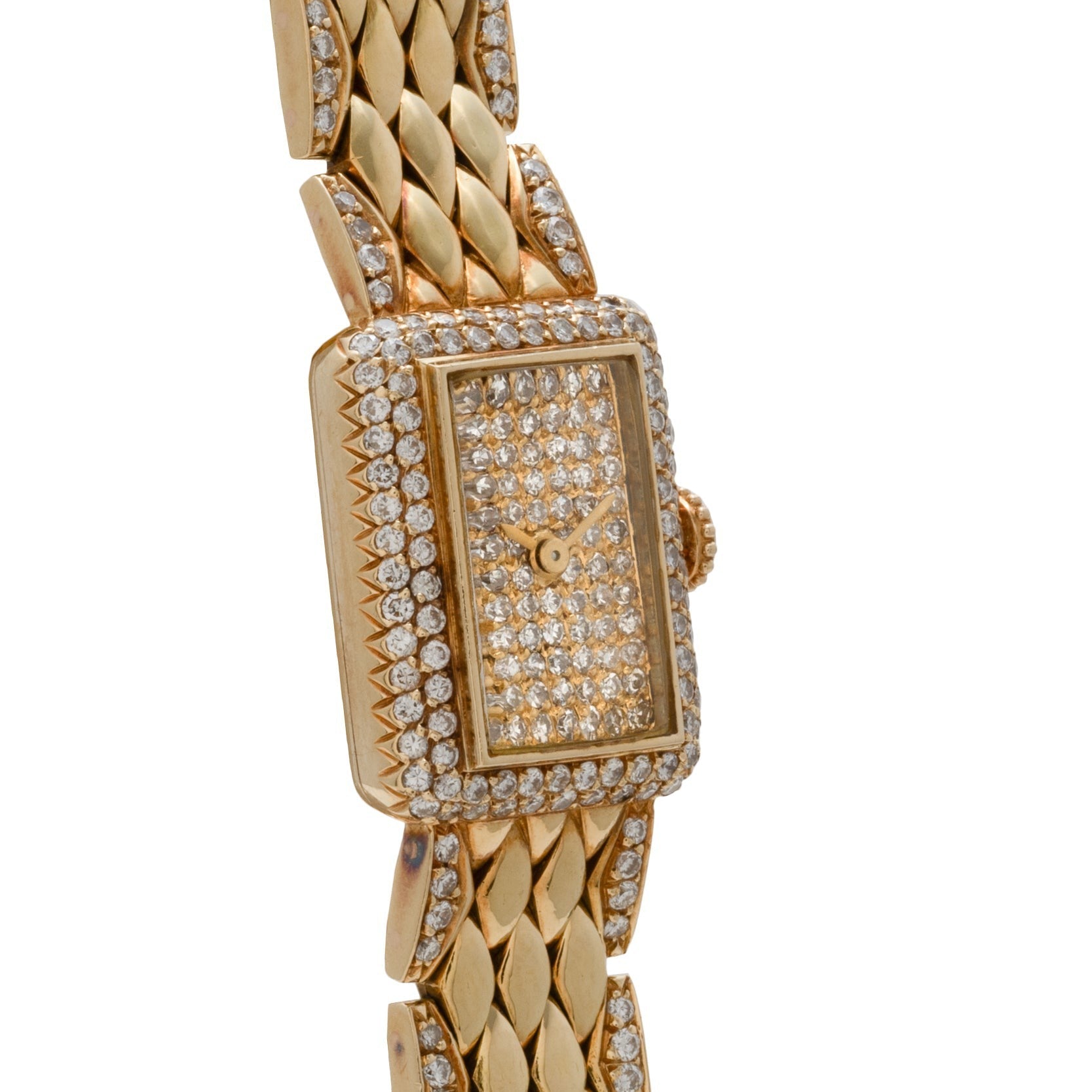 The Cartier Tank Mini Diamond features a rectangular gold case with a diamond-encrusted face, bezel, and band links.