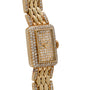 The Cartier Tank Mini Diamond features a rectangular gold case with a diamond-encrusted face, bezel, and band links.