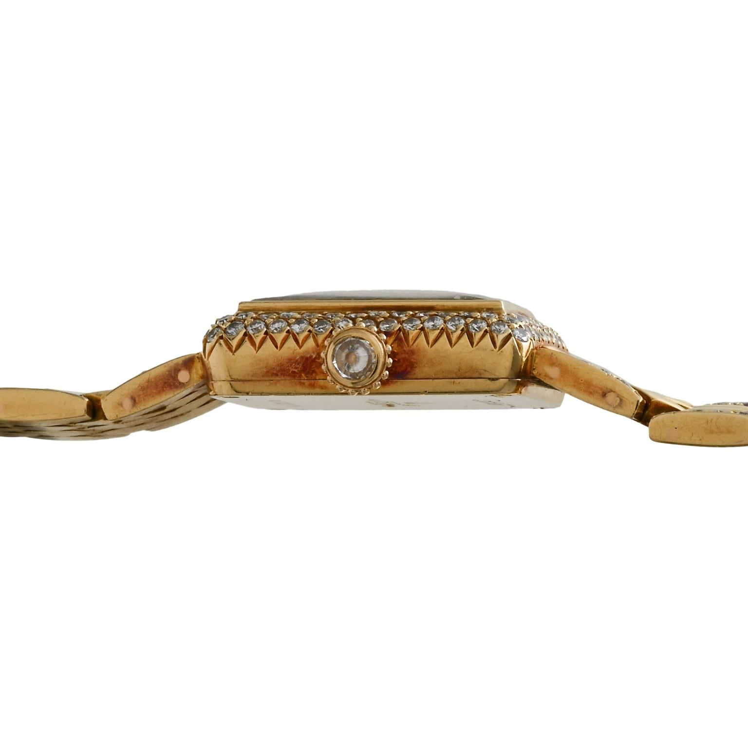 Side view of the Cartier Tank Mini Diamond gold wristwatch featuring a round crown and diamond accents along the case edge.