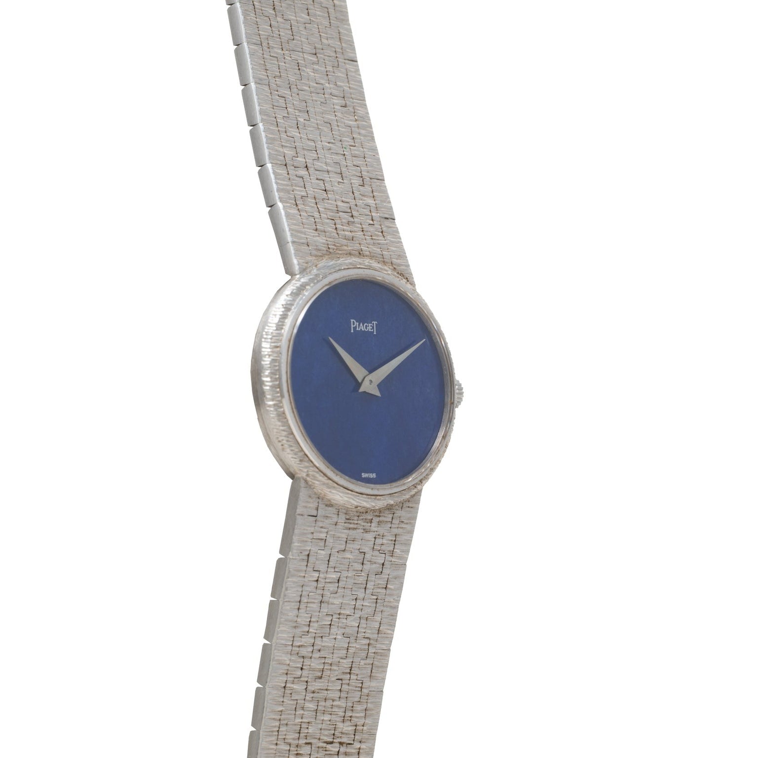 The Piaget White Gold Lapis Lazuli Dress Watch features a white gold case, a blue lapis lazuli dial, and a textured band.