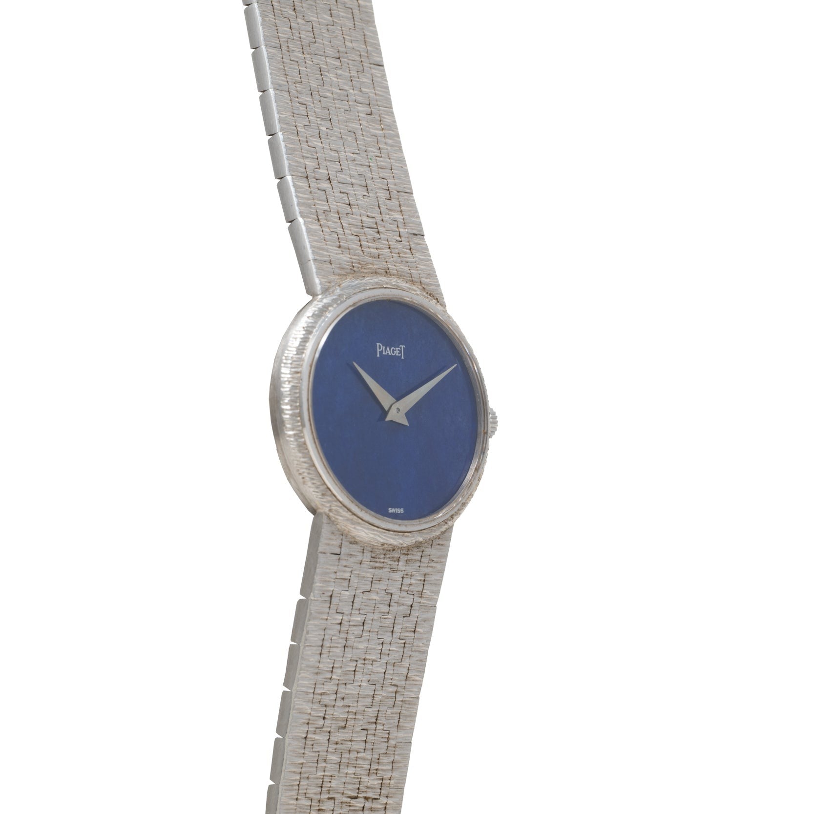 The Piaget White Gold Lapis Lazuli Dress Watch features a white gold case, a blue lapis lazuli dial, and a textured band.