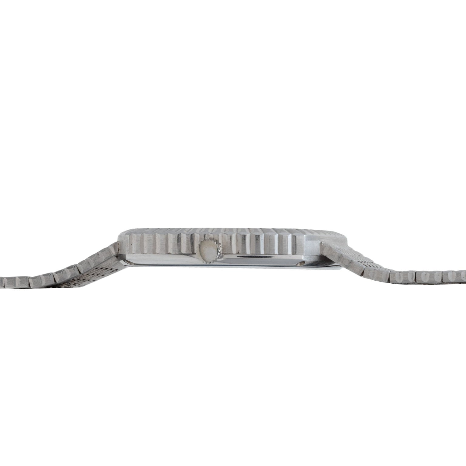Side view of the Piaget Sqound White Gold Dress Watch with a metal band and textured bezel, laid flat.