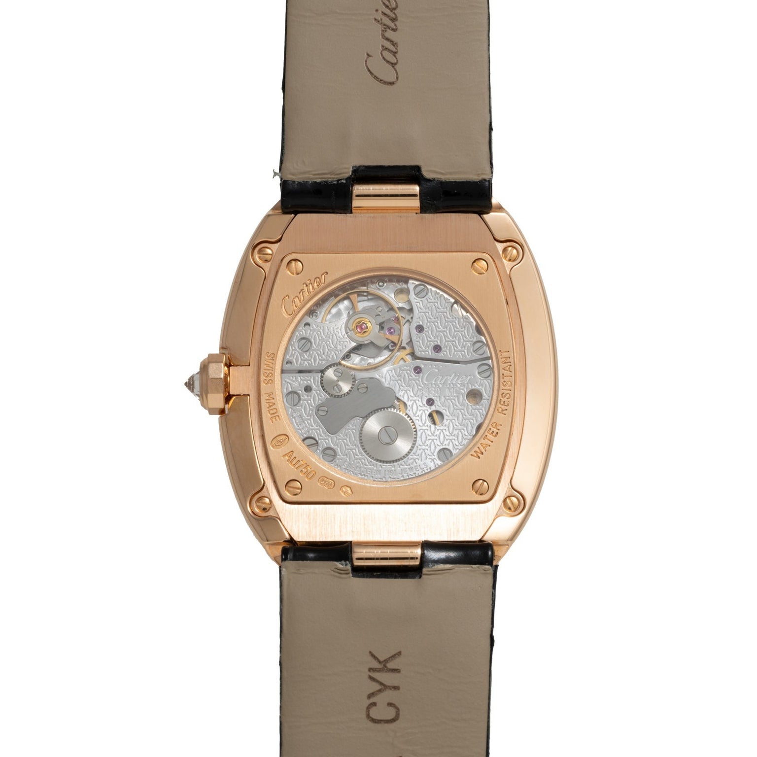 Close-up of the Cartier Baignoire Jumbo watch’s back, revealing exposed gears and engravings on its leather strap.