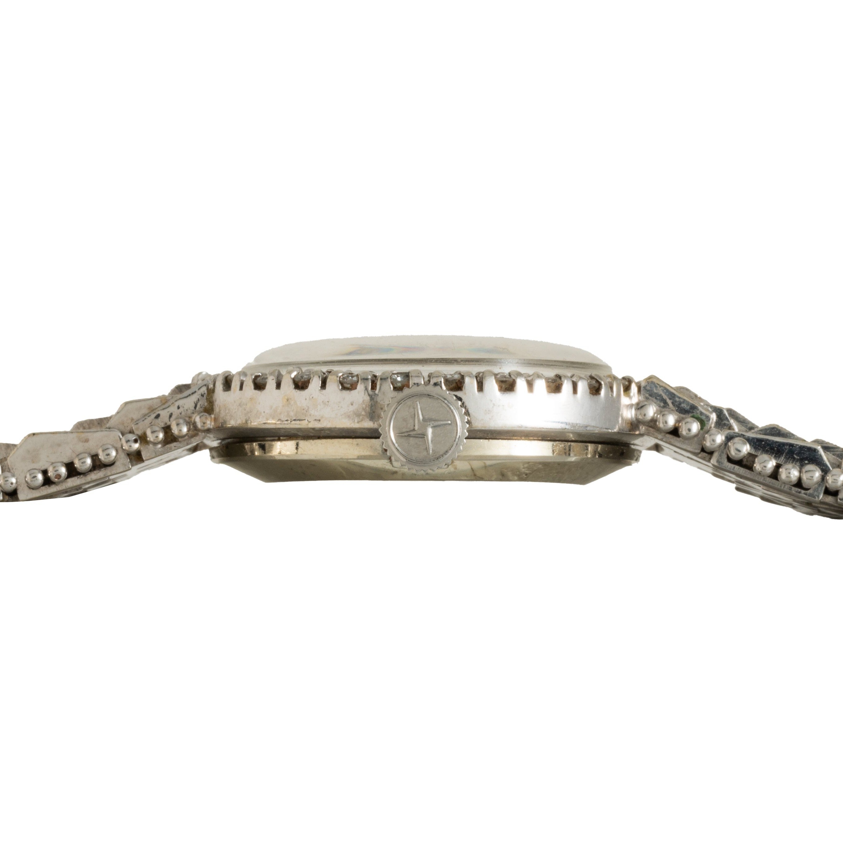 Side view of the Zenith Ladies Cocktail Watch in silver, featuring a round bezel, metal bracelet, and detailed crown and case.