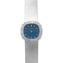 The Patek Philippe Ellipse Ladies Dress Watch features a silver mesh band, blue face, and diamond-encrusted bezel.