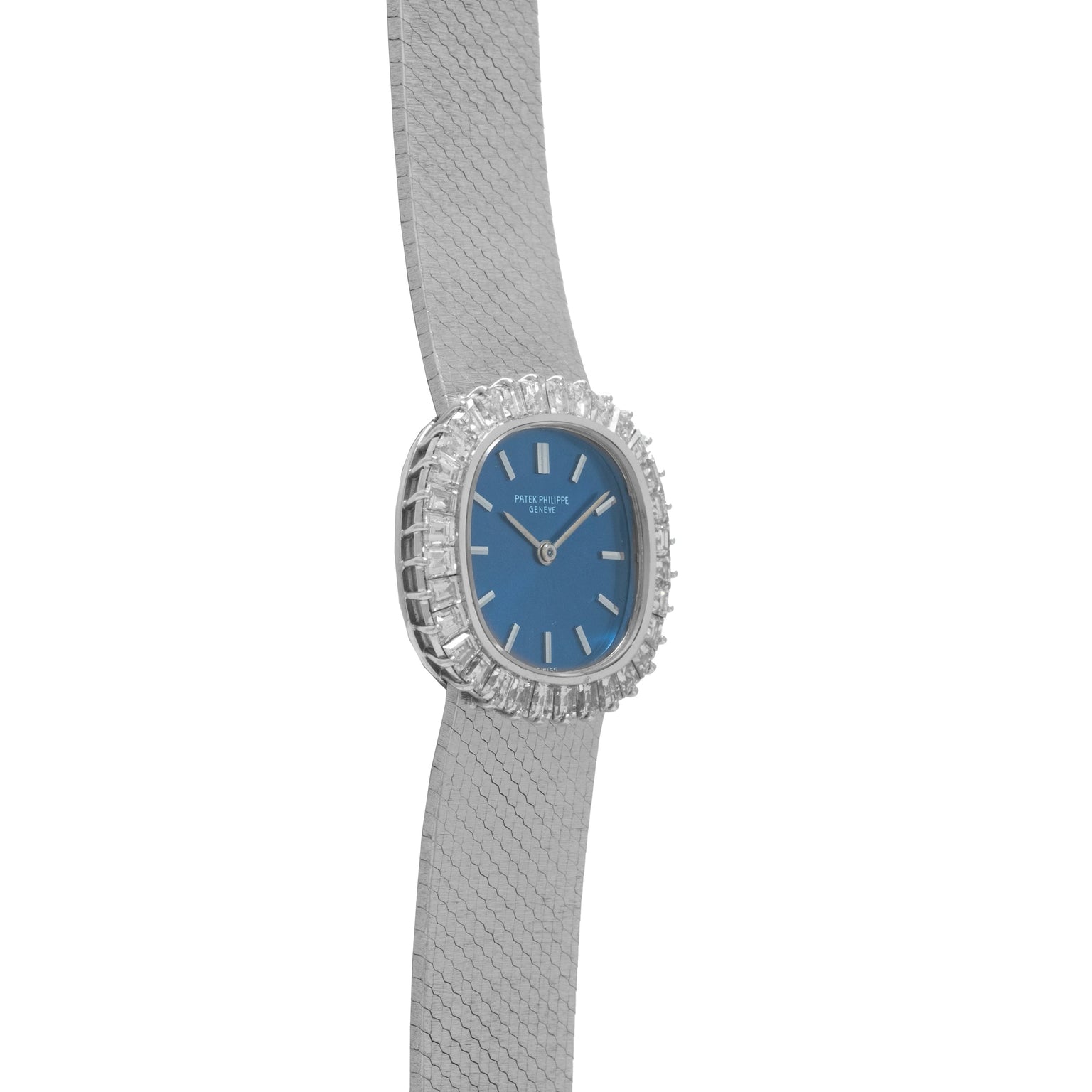 Patek Philippe Ellipse Ladies Dress Watch with a blue face and diamond-encrusted bezel on a mesh metal band, angled to the left.