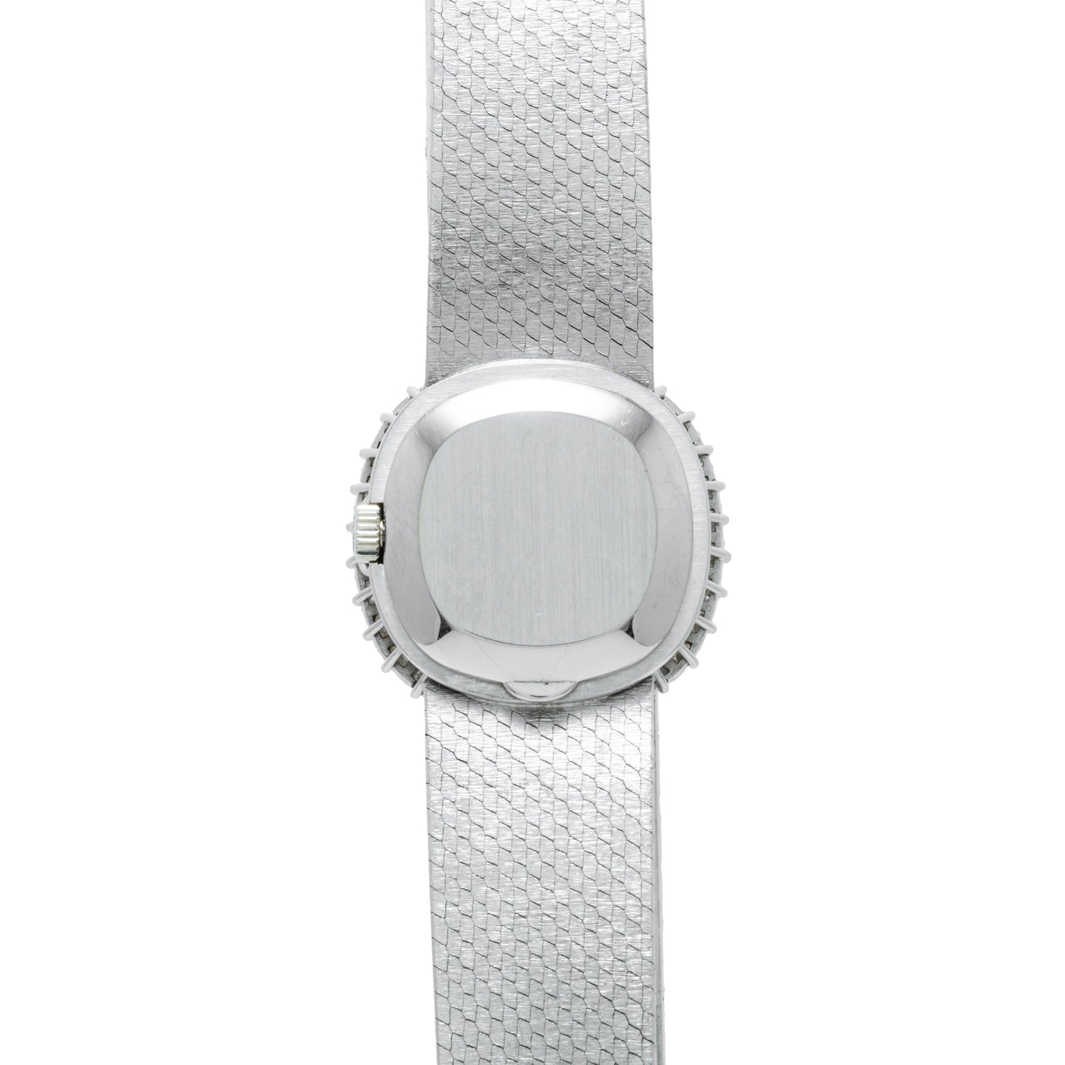 The Patek Philippe Ellipse Ladies Dress Watch features a silver textured band and a plain, square face, viewed from above.
