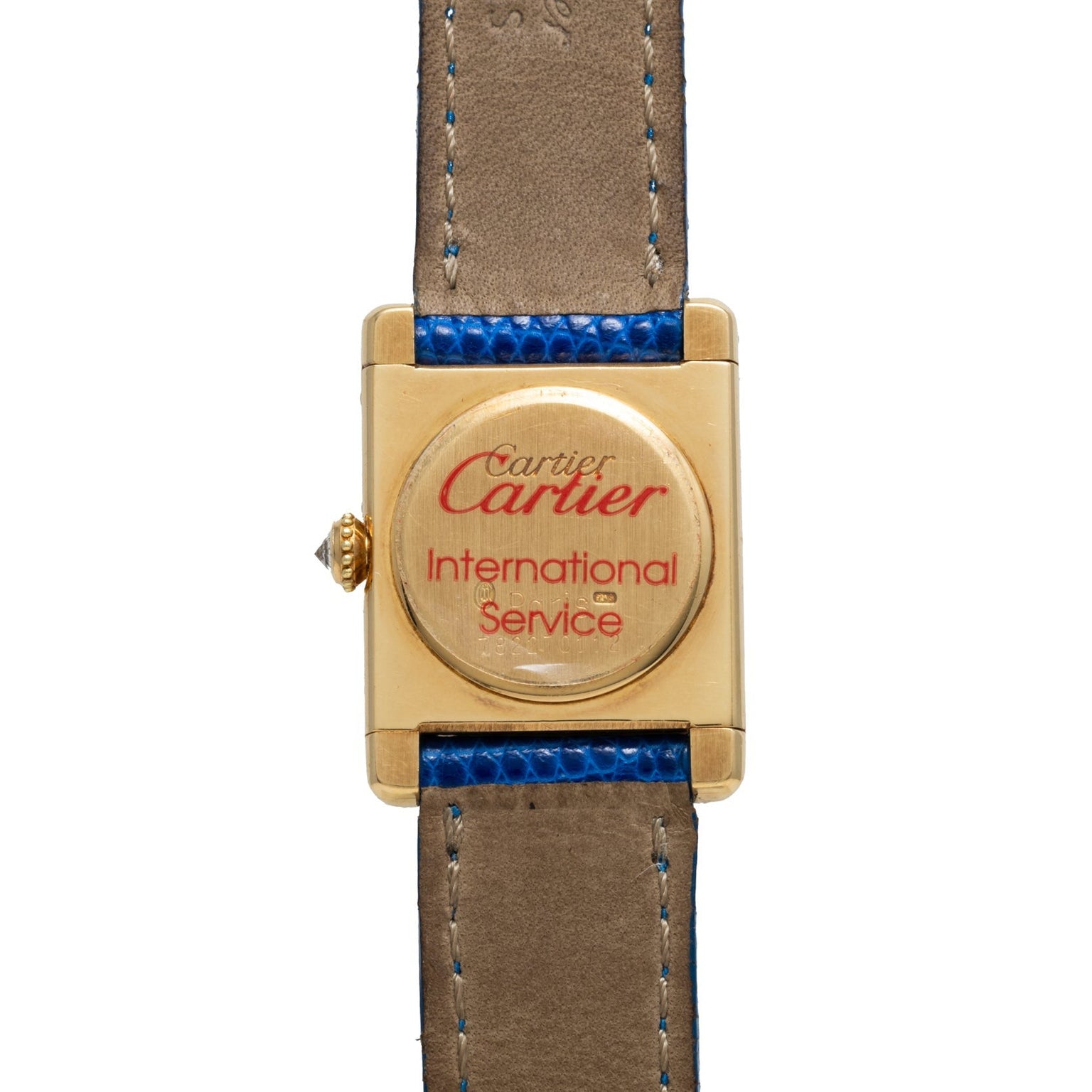 A Cartier Tank Louis Diamonds watch with a leather strap, labeled Cartier International Service on the back.
