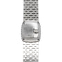 Back view of a Piaget White Gold Bark Diamond Dress Watch featuring a metal strap and engraved serial numbers on the case.