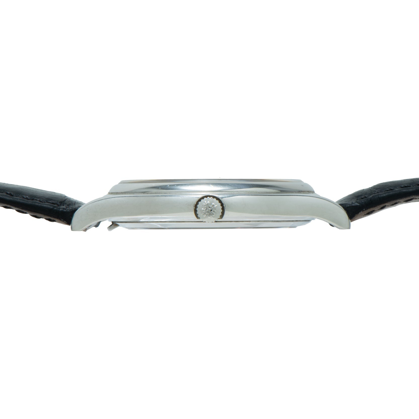 Side view of the Patek Philippe Perpetual Calendar, a silver wristwatch featuring a black leather strap and a small central crown.