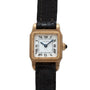 Cartier Santos Mini watch with a square white dial, Roman numerals, and a black leather strap.