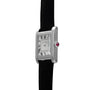 A side view of the Cartier Tank Normale, a silver watch with a black leather strap and Roman numeral dial.