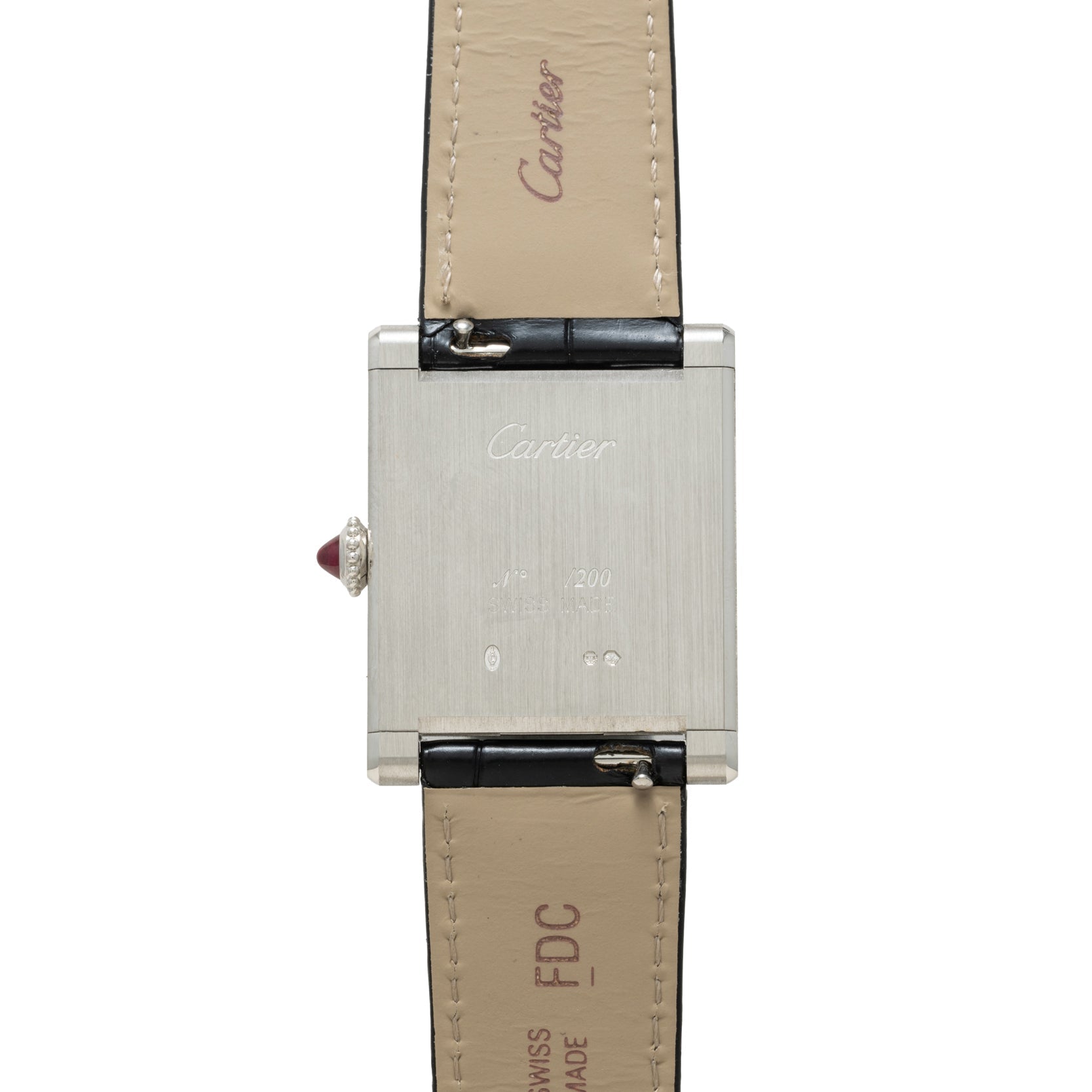 Back view of the Cartier Tank Normale watch featuring a square metal case, leather strap, and visible engravings and markings.