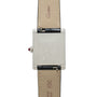 Back view of the Cartier Tank Normale watch featuring a square metal case, leather strap, and visible engravings and markings.