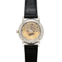 The Lange & Sohne Lange 1 Tourbillon Perpetual Calendar features a black leather strap and a transparent case back that displays its intricate gears and mechanisms.