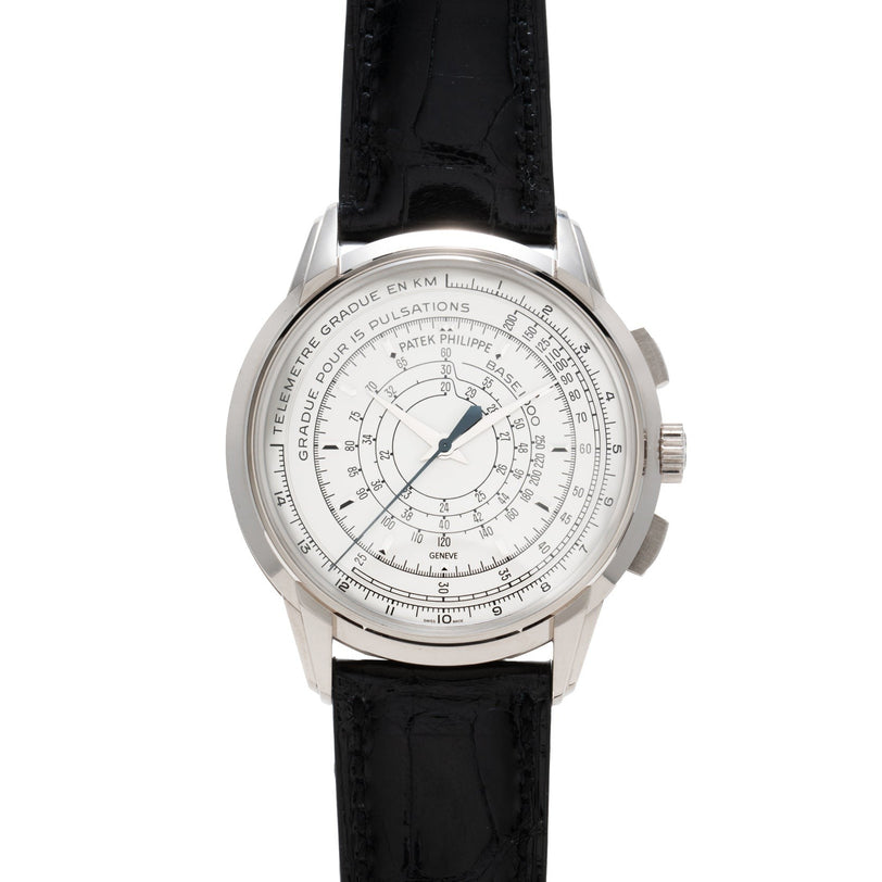 The Patek Philippe Multi-Scale Chronograph is a luxury wristwatch featuring a black leather strap and an intricate white dial with multiple scales.