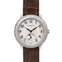 A Patek Philippe Ladies Complication watch featuring a diamond bezel, white dial, moonphase, and brown leather strap.