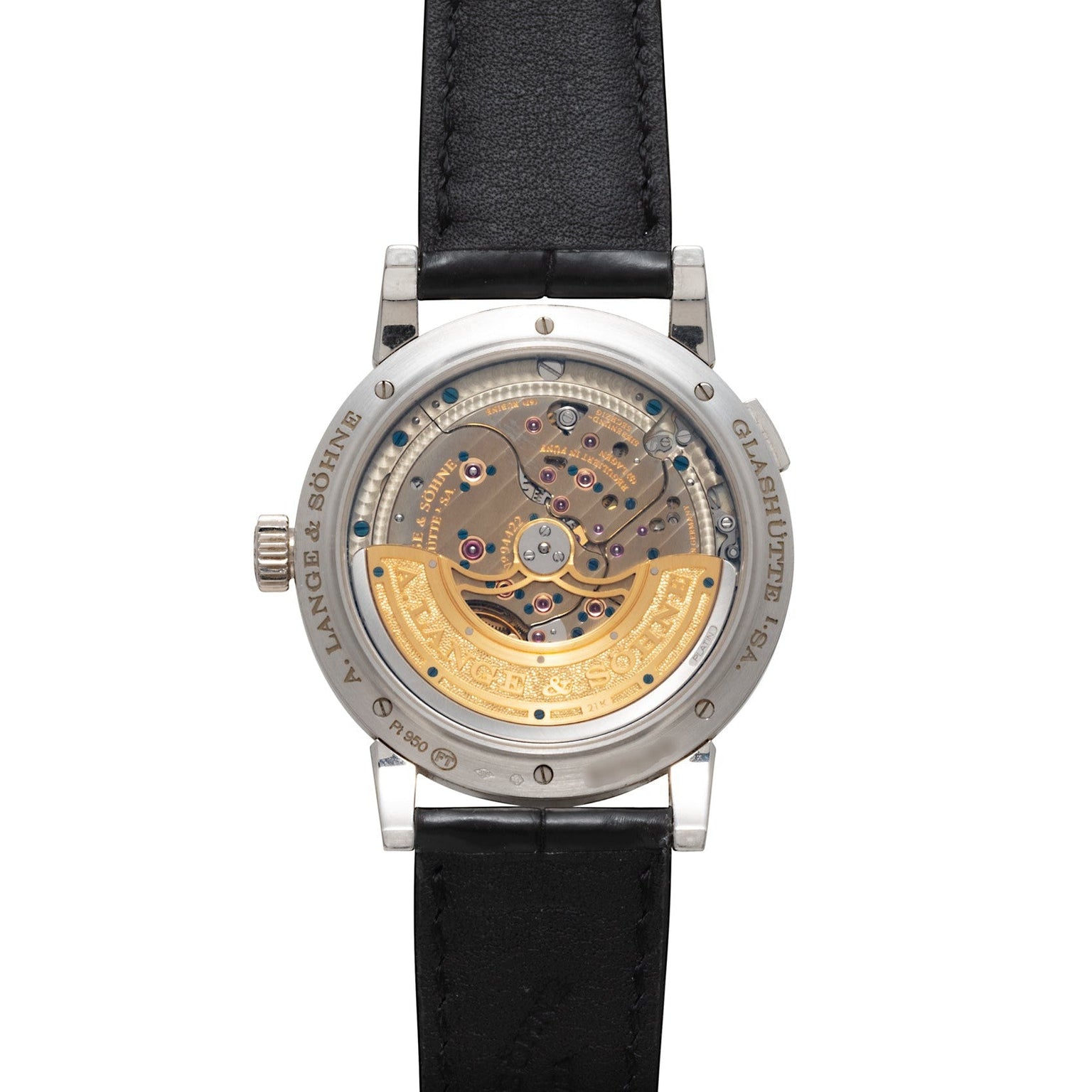 Back view of the Lange & Sohne Lange 1 Daymatic features an exposed mechanical movement with a gold rotor and a black leather strap.