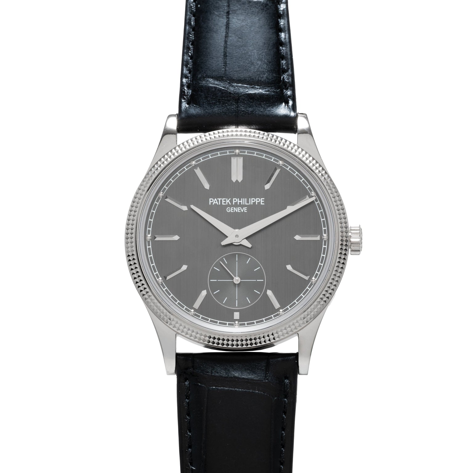 A Patek Philippe Calatrava wristwatch featuring a silver case, gray dial, and black leather strap.