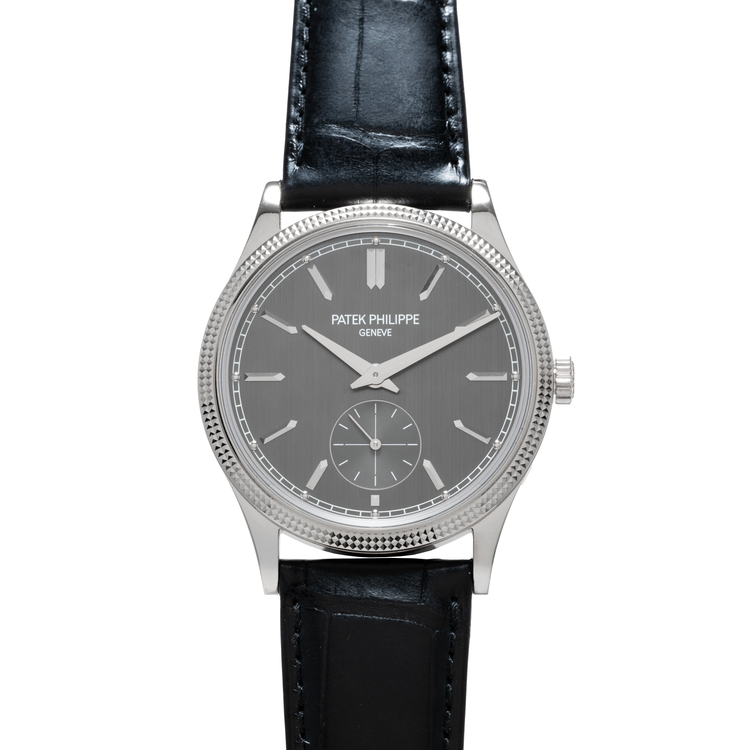 A Patek Philippe Calatrava wristwatch featuring a silver case, gray dial, and black leather strap.