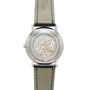 Back view of the Patek Philippe Calatrava showcasing its exposed intricate mechanical movement and black leather strap.