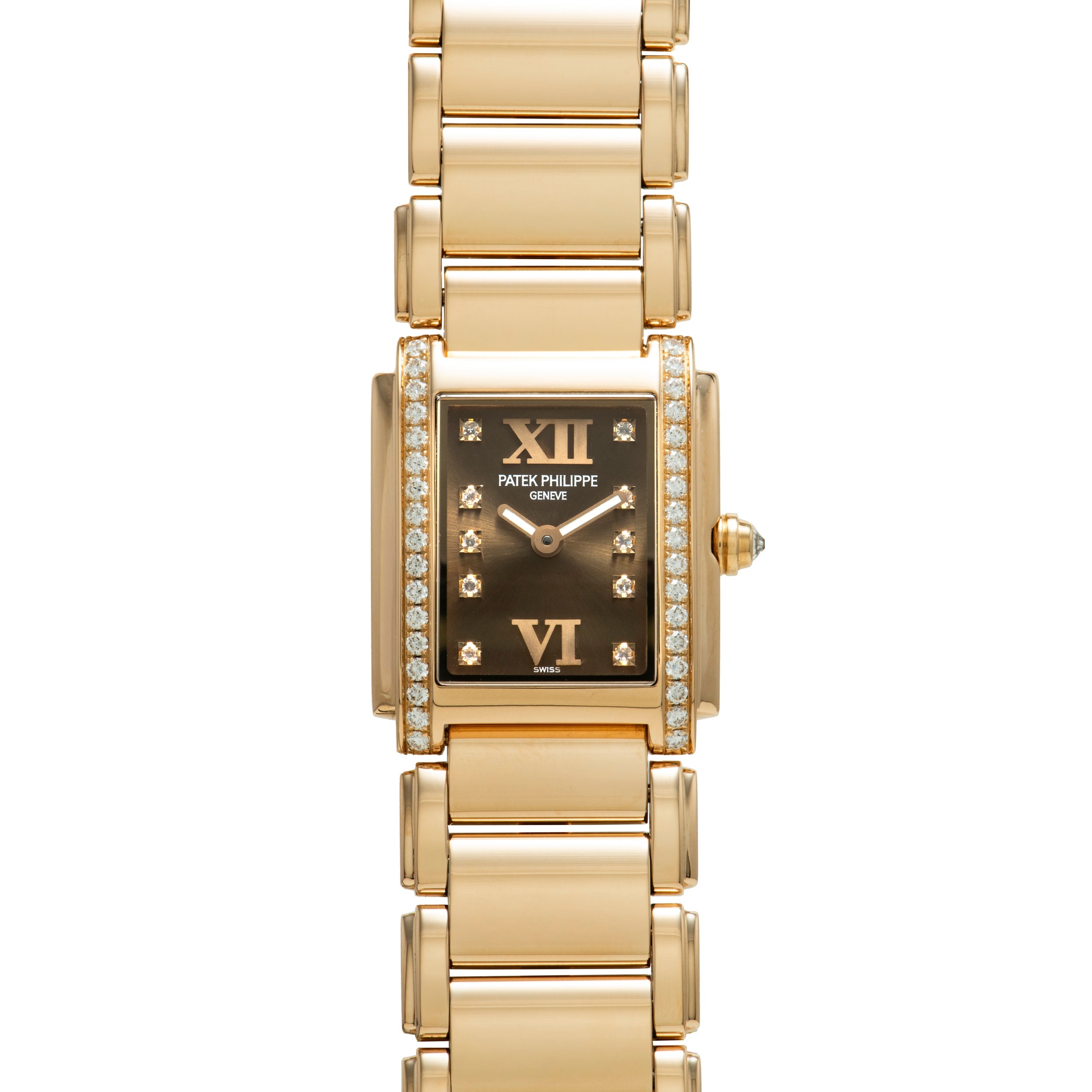 Patek Philippe Twenty-4 gold watch featuring a rectangular face, diamond accents, and Roman numerals at 12 and 6.