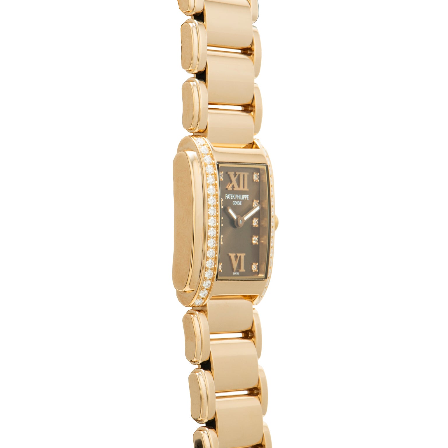 The Patek Philippe Twenty-4 luxury wristwatch features diamond accents and a black Roman numeral dial, displayed from a side angle.