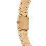 The Patek Philippe Twenty-4 wristwatch features a gold square face, shown from the back to highlight its metal link band and crown.