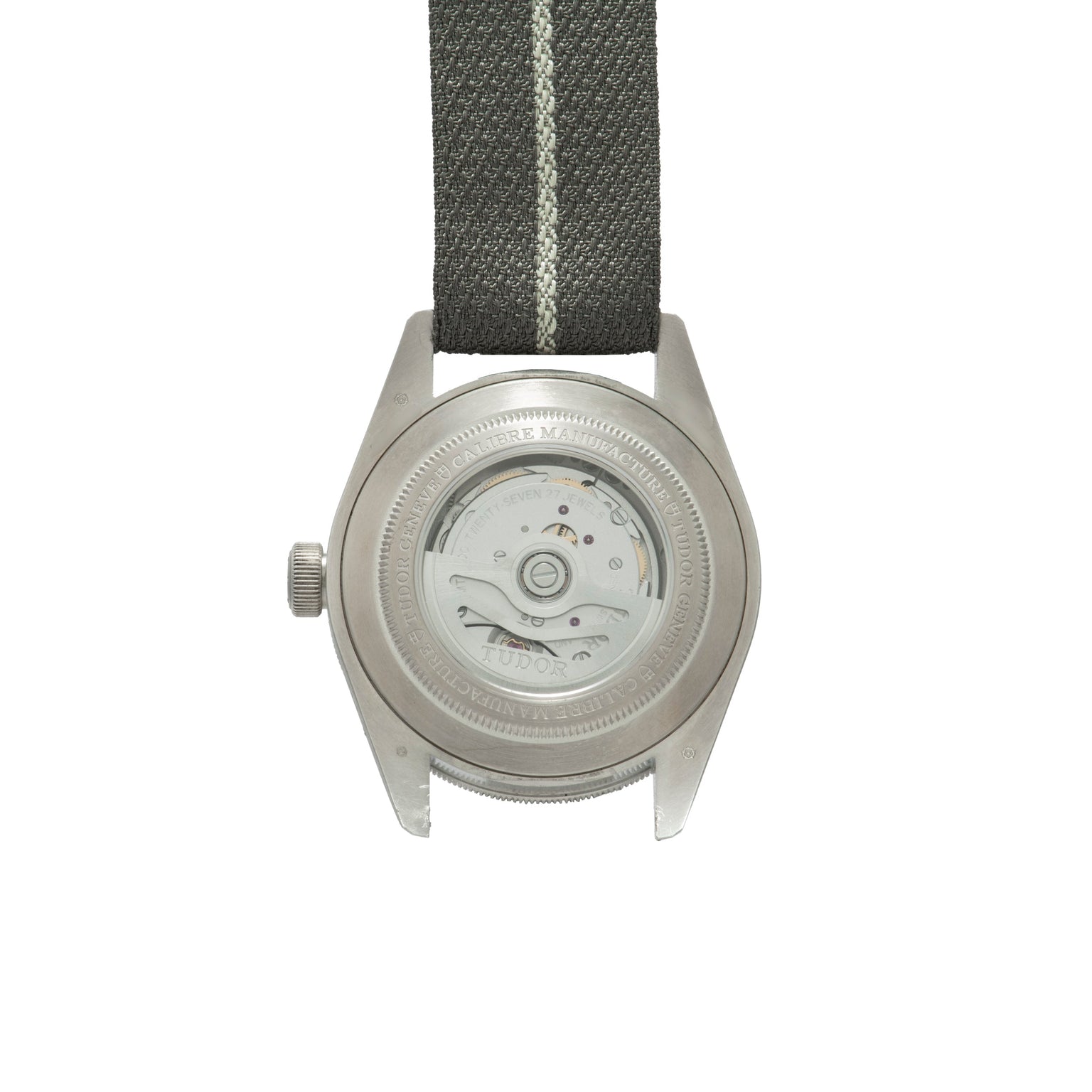 Back view of the TUDOR Black Bay 58 Silver watch, featuring a visible automatic movement and a black fabric strap.