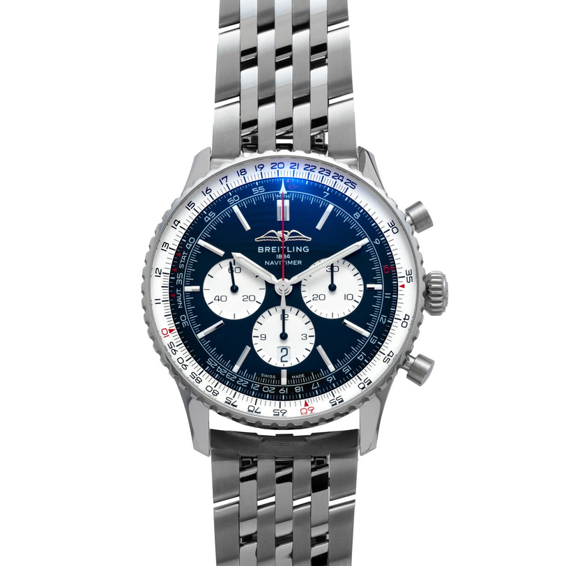 Breitling Navitimer 46 watch with a blue dial, three white subdials, and a stainless steel bracelet.
