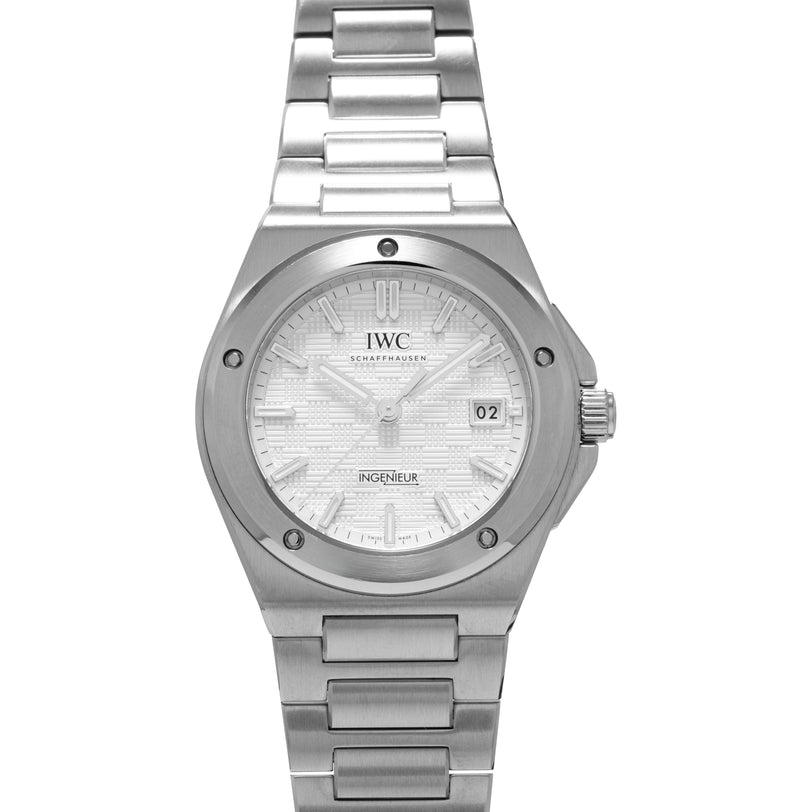 The IWC Schaffhausen Ingenieur features a silver tone, white textured dial, metal bracelet, and a date display at 3 o’clock.