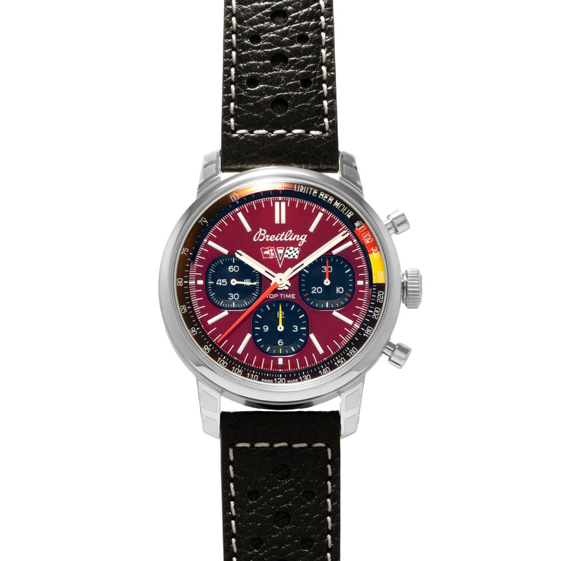 The Breitling Top Time B01 Chronograph Chevrolet Corvette features a maroon dial with three blue subdials and a black leather strap accented by white stitching.
