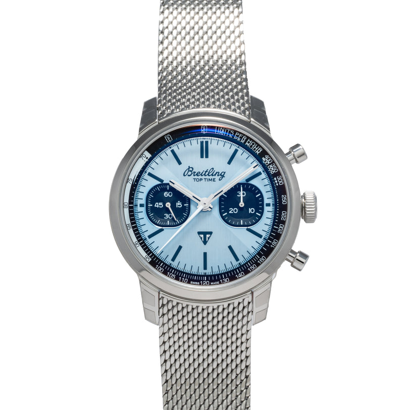 Breitling Top Time B01 Chronograph Triumph wristwatch with a mesh strap and blue-accented chronograph dial, viewed from above.