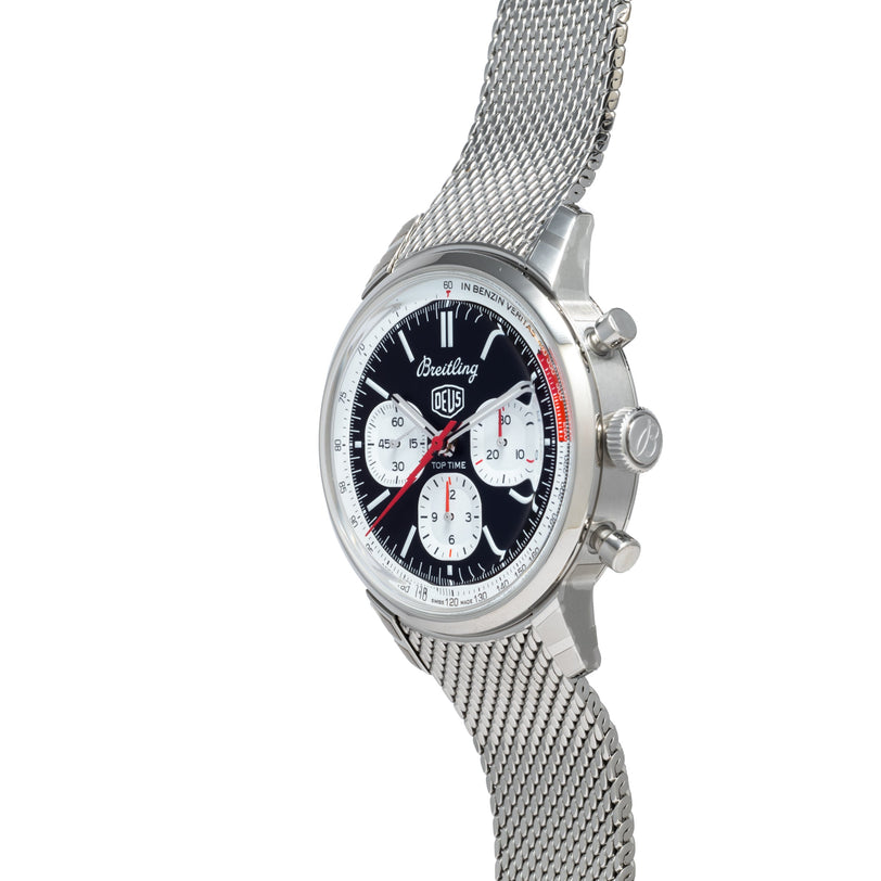 The Breitling Top Time B01 Chronograph Deus wristwatch features a mesh metal band and a black-and-white dial, shown at an angle.