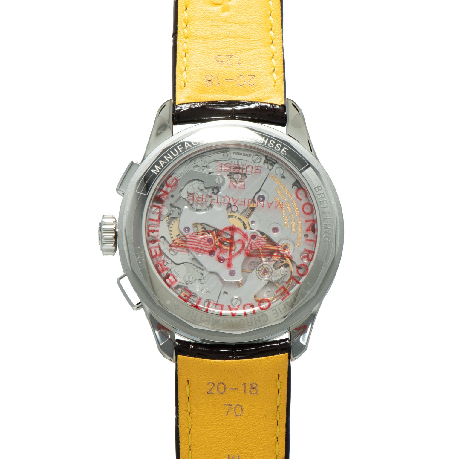 Back of a Breitling Premiere B09 Chronograph 40 with a transparent case revealing inner mechanisms and a yellow leather strap.
