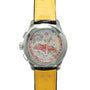 Back of a Breitling Premiere B09 Chronograph 40 with a transparent case revealing inner mechanisms and a yellow leather strap.