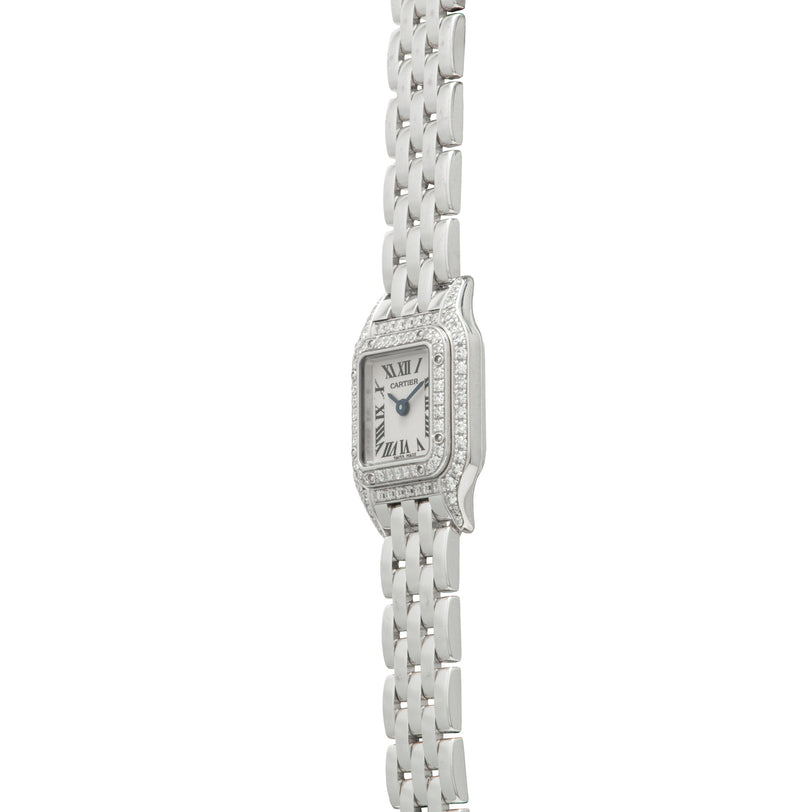 White gold rectangular watch with diamond-set bezel and bracelet, cream dial with Roman numerals.