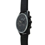 Zenith Chronomaster El Primero watch with black dial, chronograph subdials, three pushers, and black textile strap.