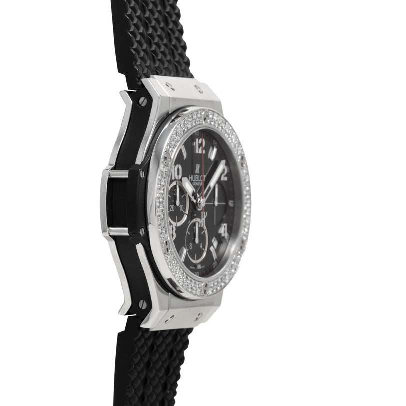 Steel chronograph watch with diamond-set bezel, black dial, and black rubber strap.