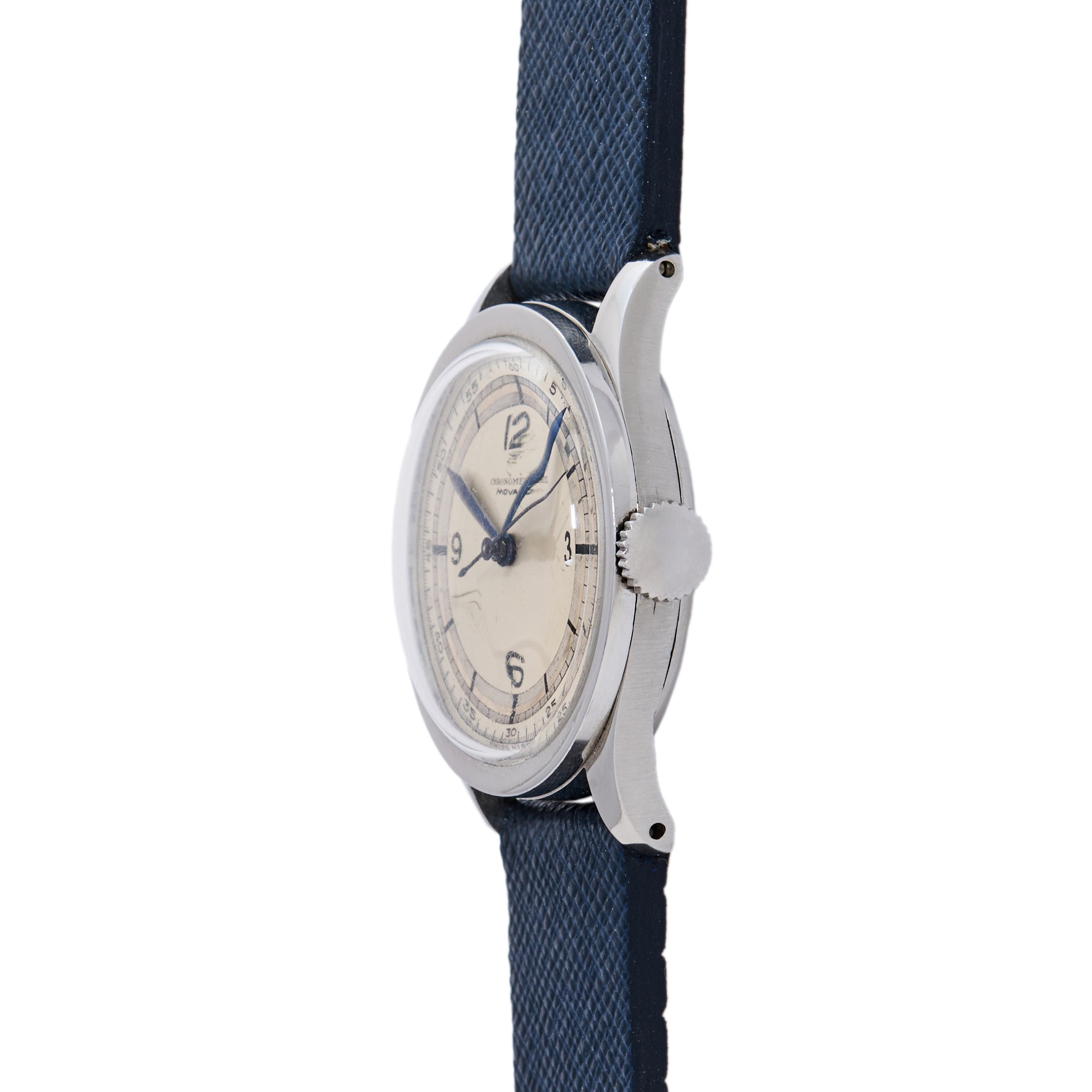 The Movado 'Calatrava' Steel showcases a round silver case, cream dial with black numerals, and blue leather strap—an elegant tribute to Swiss watchmaking, seen from the side on a white background.