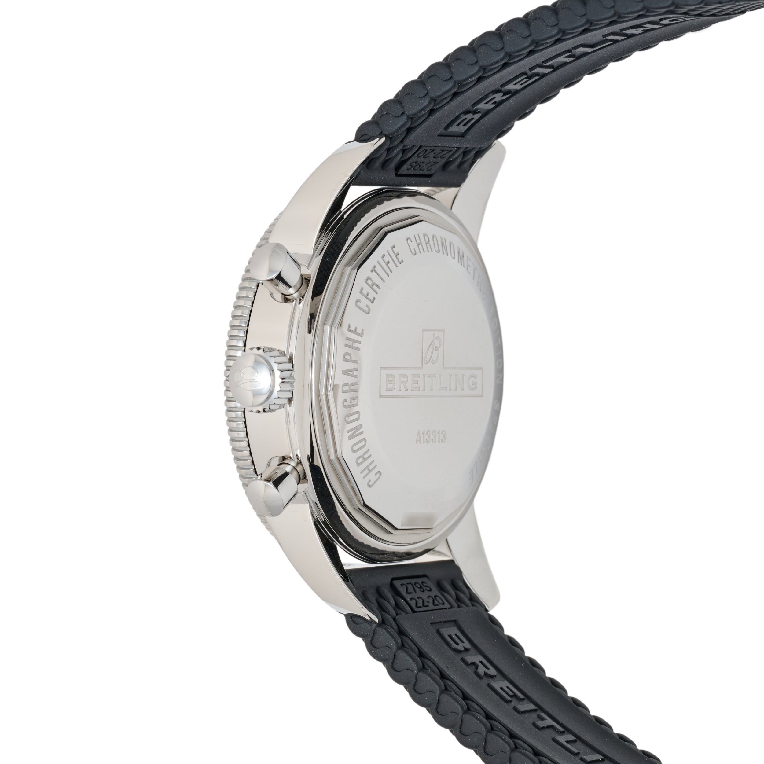 Side view of a Breitling SuperOcean Heritage Chronograph 44 showing the stainless steel case back with logo and engraving, black textured rubber strap with BREITLING embossing, plus visible crown and chronograph pushers.