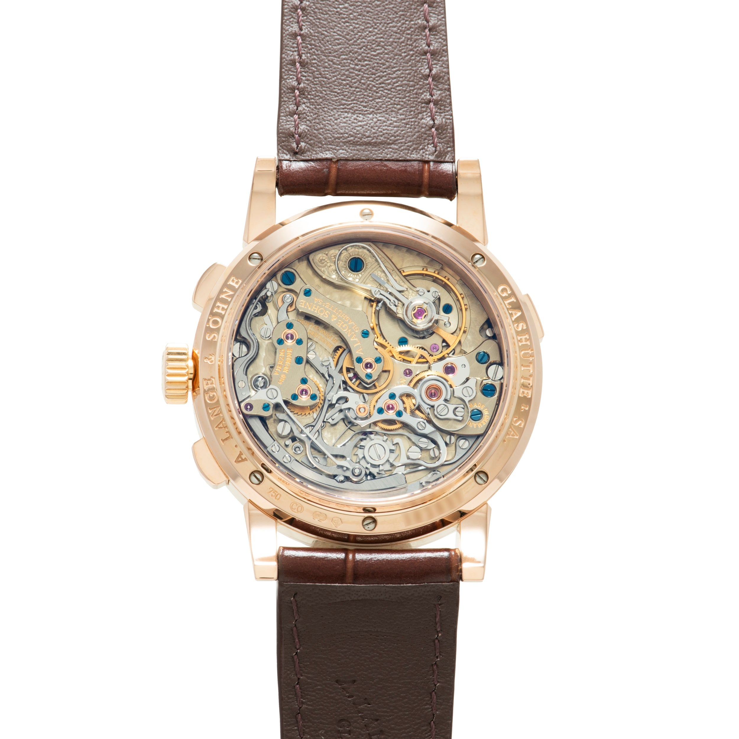Rose gold chronograph watch with skeletonized movement visible through caseback, brown leather strap.
