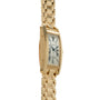 Gold-tone rectangular watch with white dial, Roman numerals, and matching linked bracelet.