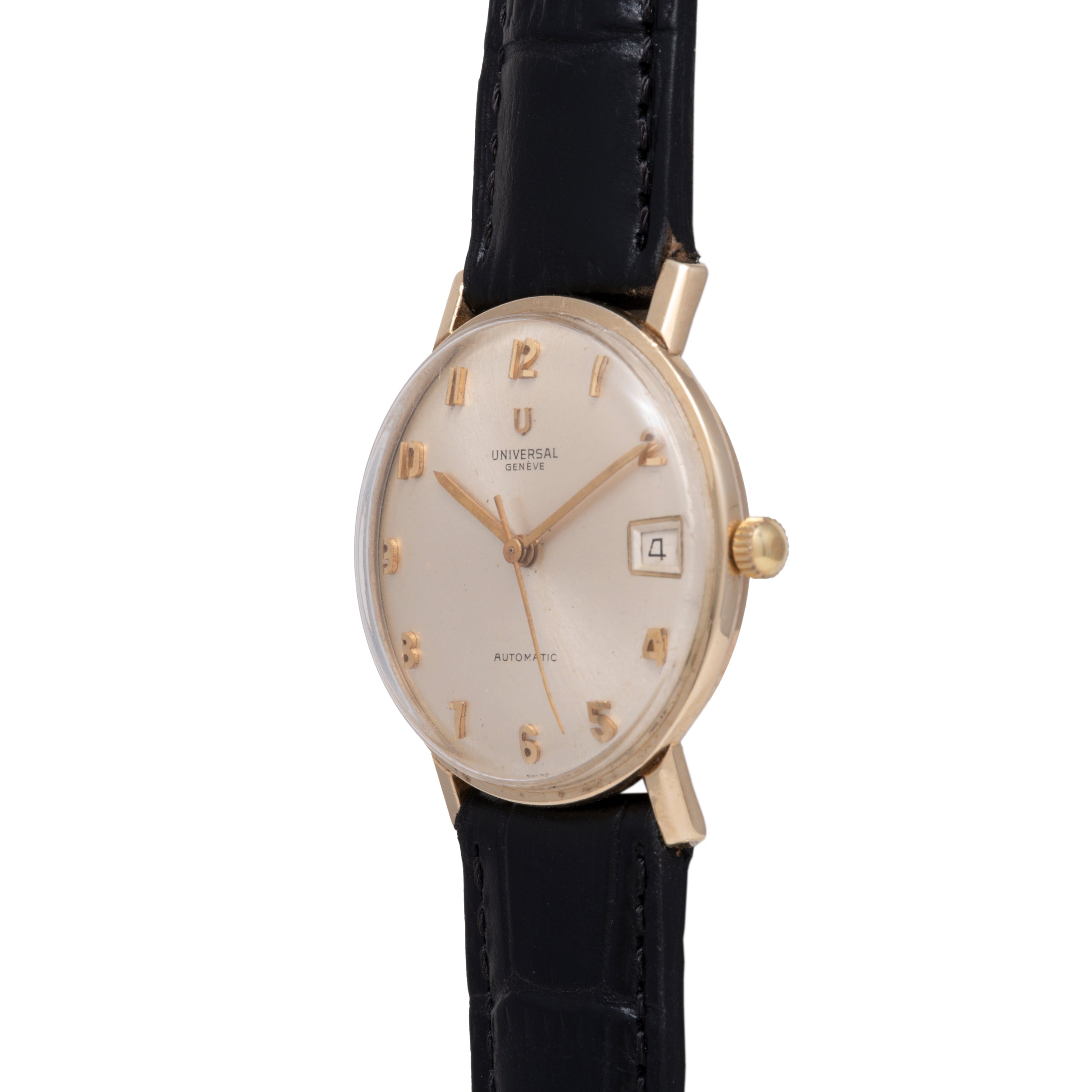 Universal Geneve wristwatch with cream dial, gold-tone numerals, date window, and black leather strap.