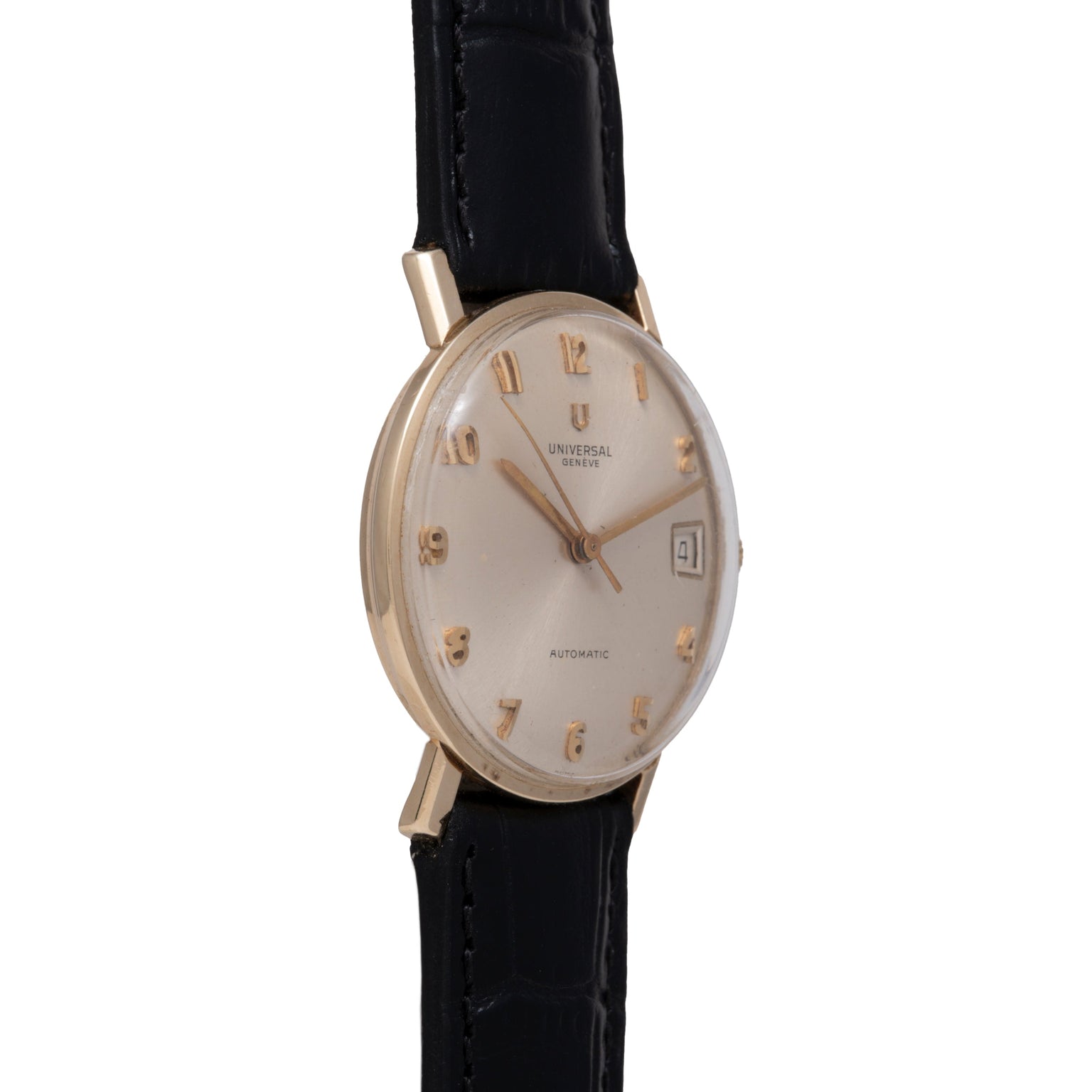 Universal Geneve Calatrava watch with silver dial, gold-tone numerals, date window, and black leather strap.