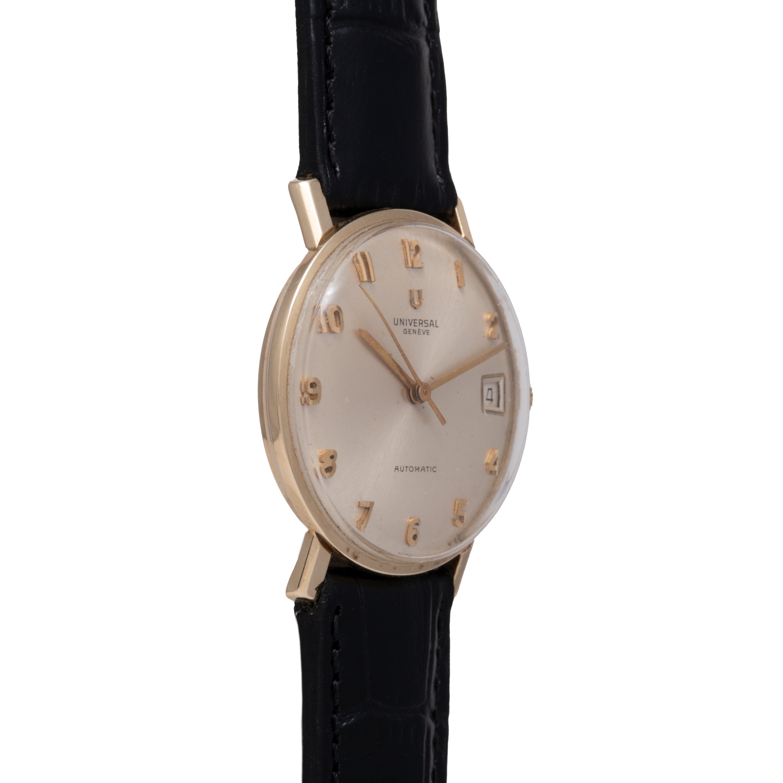 Universal Geneve Calatrava watch with silver dial, gold-tone numerals, date window, and black leather strap.