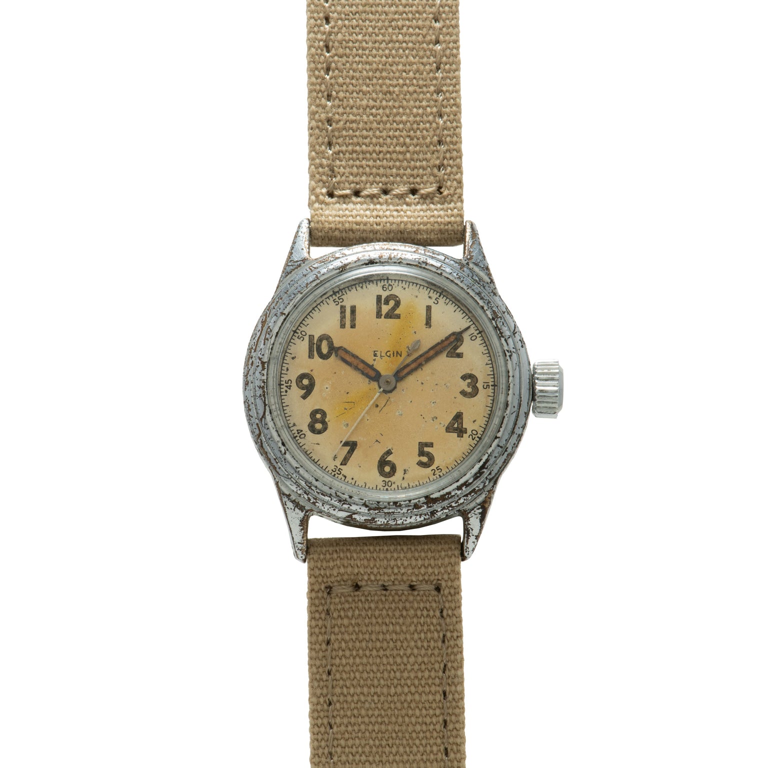 Elgin military watch with weathered steel case, cream dial with Arabic numerals, and tan fabric strap.